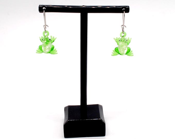 One pair of Miniature Glass Glow in the Dark Frog Earrings