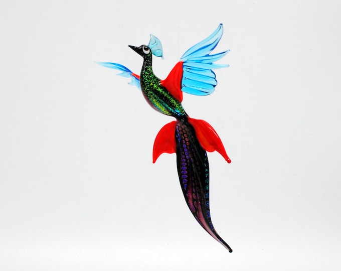 Peacock in flight