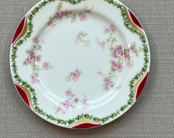 Plato antiguo Haviland Limoges Francia con ramita de rosa rosa y detalles dorados magenta.