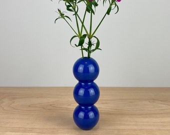 Blue ceramic bud vase
