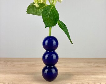 Dark blue ceramic bud vase