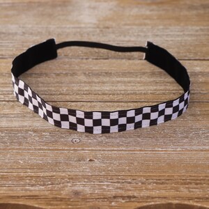 May include: Black and white checkered headband with a black elastic band.