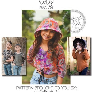 May include: A girl wearing a colorful hooded sweatshirt with a tie at the waist. The sweatshirt has a floral pattern. The girl is wearing jeans and has long brown hair. The image also includes text that says "rory raglan" and "inge lace collection".