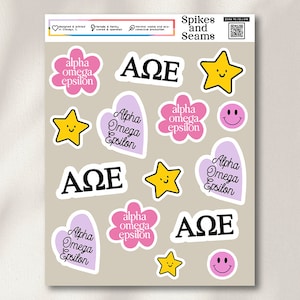May include: A sheet of stickers featuring a sorority's letters, "AOE", in various styles. The stickers include hearts, stars, flowers, and smiley faces in pink, yellow, and purple.