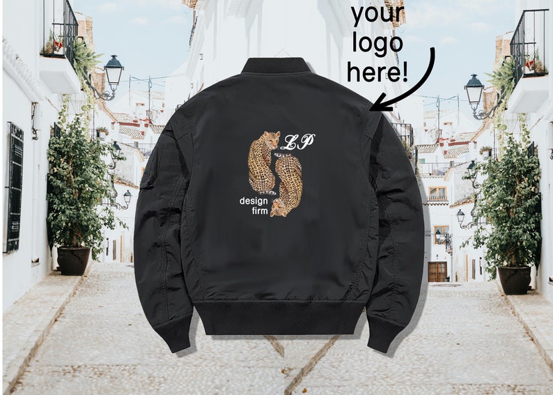 May include: Black bomber jacket with a design featuring two leopards and the text "LP design firm" on the back.
