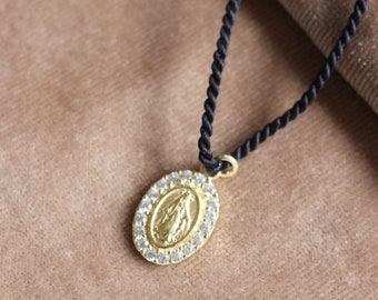 CZ Virgin Mary Medal necklace on a silk string, available in 18K Gold plated over sterling Silver or 925 sterling Silver and 12 silk colors