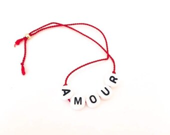 Amour word Bracelet on silk string, available in multiple colors