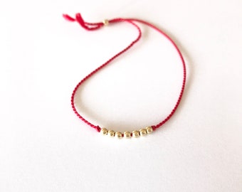 Beaded silk string bracelet, each bead represents a special person in your life, carry them with you at all times
