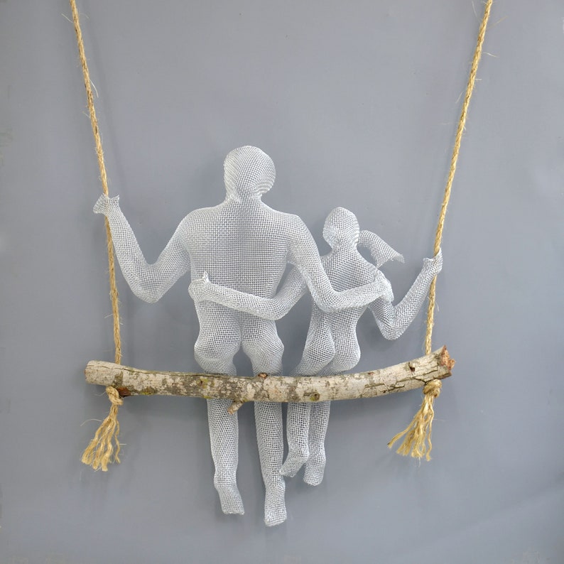 Metal wall art couple on a swing 3d wall art Contemporary Etsy