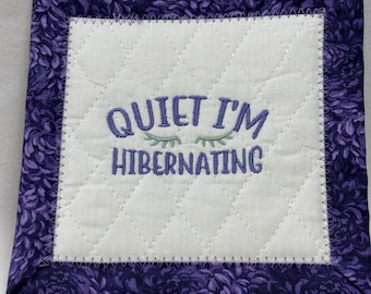 Embroidered Coffee Mug Rug: "Quiet I'm Hibernating" Desk Coaster