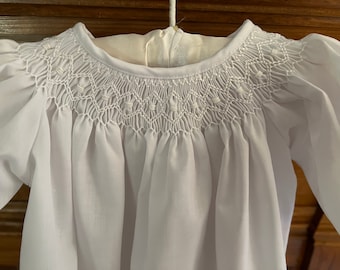 Christening or Baptisms gown.  Smocking around the collar.