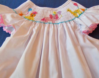 Circus  birthday bishop dress with Circus animals.  Pink, white and light blue