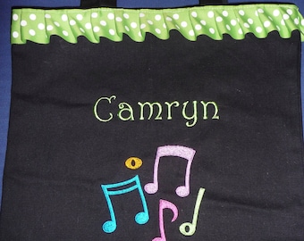 Bag embroidered with music notes