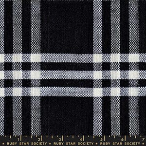 May include: Close-up of a black and white plaid fabric. The pattern features a grid of thick black and white stripes, creating a classic checkered design. The fabric has a woven texture, and the Ruby Star Society logo is visible at the bottom.