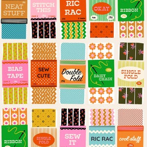 May include: A collection of twenty-five rectangular sewing trim cards arranged in a grid. Each card features colorful patterns including floral, polka dot, and wavy designs, with printed text labels like Ric Rac, Bias Tape, and Daisy Chain.