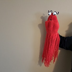 Soft crochet  monster hand puppet.  Alien yip yip,