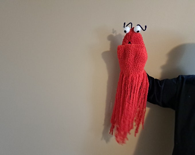 Soft crochet  monster hand puppet.  Alien yip yip,