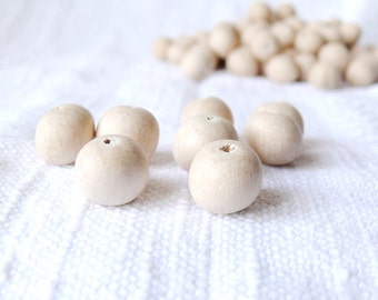 Cuentas de madera natural de 13 mm (10/25/50/100 unidades). Fabricadas con madera de haya ecológica, ideales para bisutería, manualidades y proyectos de bricolaje.
