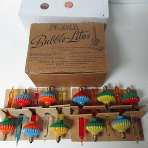 10 zabytkowych lampek choinkowych Noma C-6 w oryginalnym brązowym pudełku nr 3