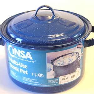 May include: A blue speckled stock pot with a matching lid and two side handles. The pot is labeled "CINSA Multi-Use Stock Pot" and holds 5.25 quarts. The pot has a handle on the lid and a picture of food inside.