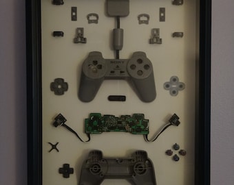 Mando de PlayStation de Sony: vista interior, marco negro, caja con sombras (PS1 original, PS One, PS)