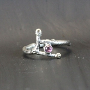 A Womans Silver Gold  Tourmaline Twig  Ring