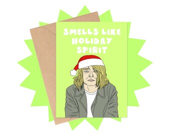 May include: A green card with the text "Smells Like Holiday Spirit" in white. A cartoon illustration of a person wearing a Santa hat and a jacket.