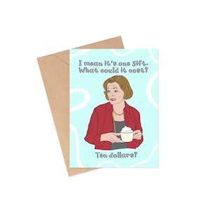 May include: Greeting card with a cartoon illustration of a woman in a red jacket holding a cup. The card has text that reads "I mean it's one gift. What could it cost? Ten dollars?" The card is paired with a brown envelope.