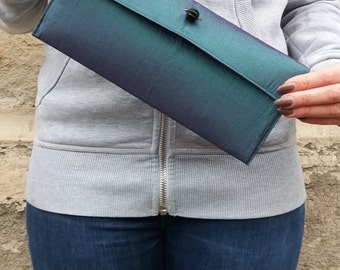 Bright emerald green two-tone taffeta clutch bag with contrasting colour lining, small clutch bag, green purse