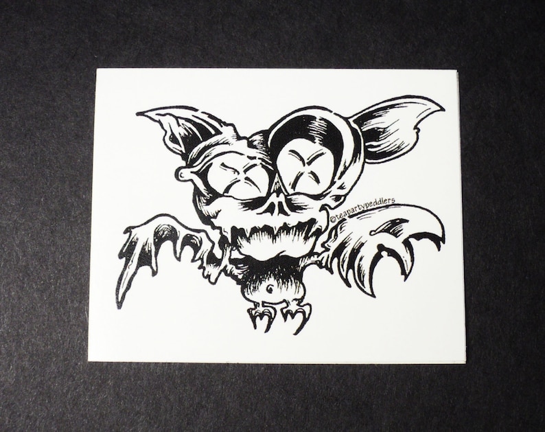 Black and White Vinyl Stickers Original Design of Cartoon Bat with Abstract Wings and Wild Eyes!