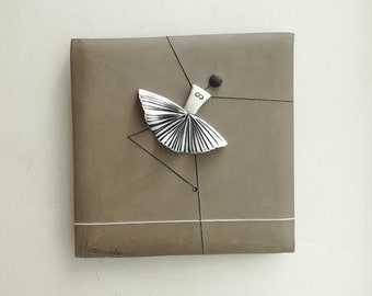 Ballerina wall hanging, porcelain ballerina in grey background, square wall tile of stoneware and porcelain