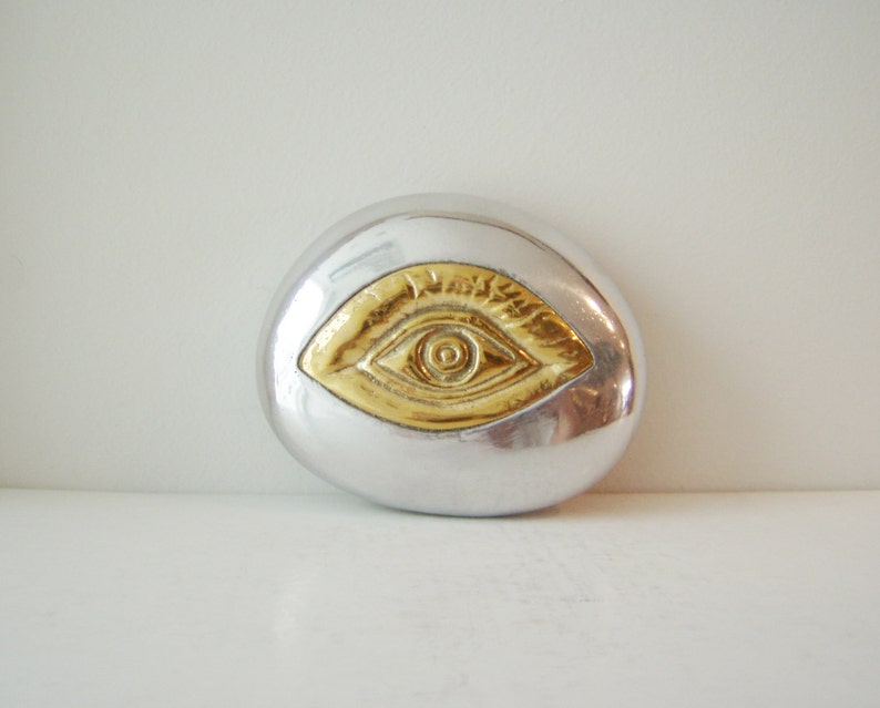 Brass eye paperweight pebble, brass eye on aluminum pebble, small sculpture, Greek art object, Greek folk art eye, eye keepsake, eye gift image 1