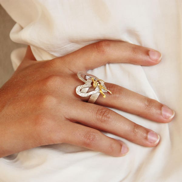 Heart silver ring, heart and man gold and silver ring, silver heart outline with gold man figure in it, adjustable steling silver ring