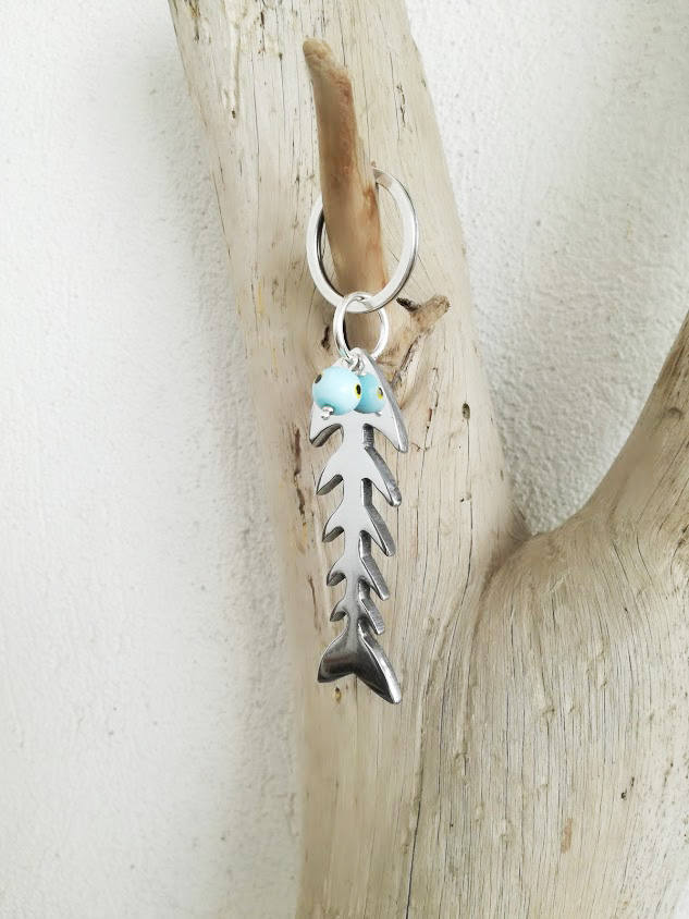Silver fishbone keychain, aluminum fish bone, mini sculpture with blue
