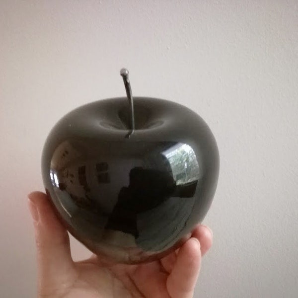 Black apple sculpture,  glossy ceramic apple in black, earthenware clay black apple with black, metal stem, life size