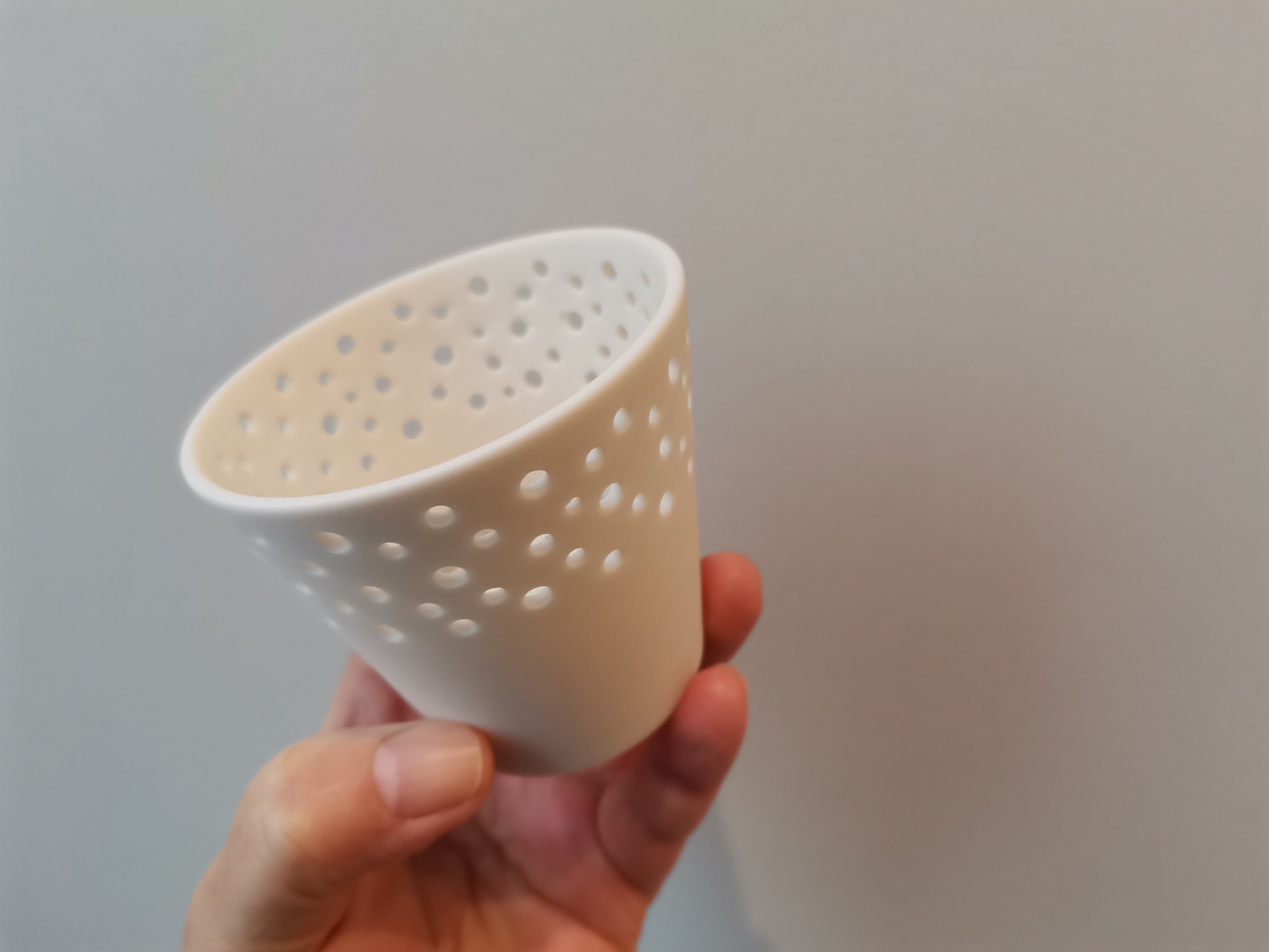 Porcelain tea light, perforated, porcelain tea light holder, white