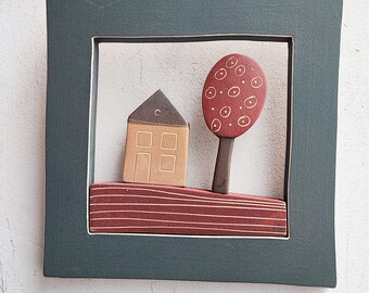 Cottage and tree wall hanging, stoneware clay wall hanging of small house and tree in square, ceramic frame