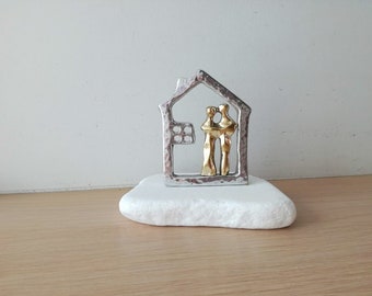 House and couple sculpture, aluminum house outline with brass couple, modern house and lovers sculpture, metal house and couple on stone