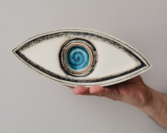 Large blue eye, ceramic, blue eye sculpture, handbuilt, stoneware clay, minimalist blue eye