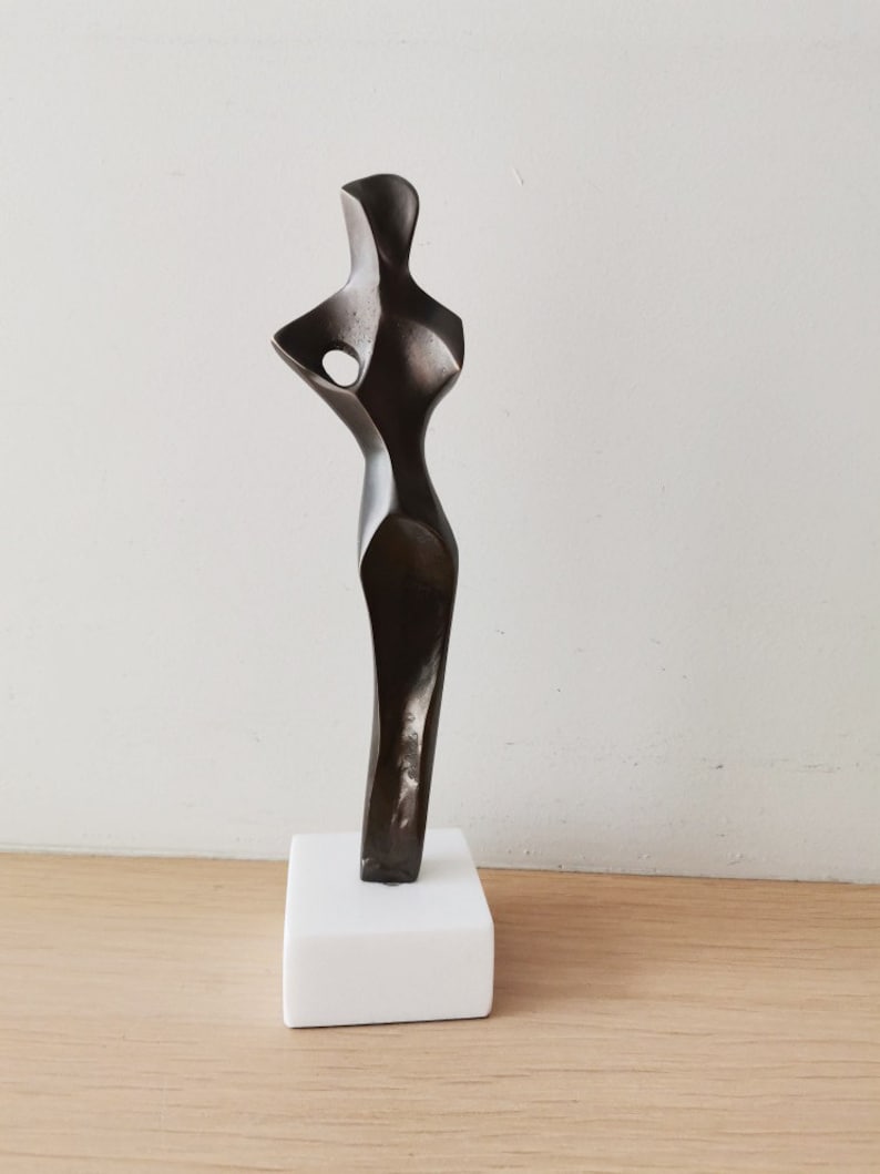 Abstract figure sculpture, solid brass, brute minimalist aesthetic, oxidised brass woman figure on marble image 5