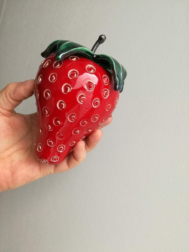 Large strawberry sculpture, scarlet ceramic strawberry with green
