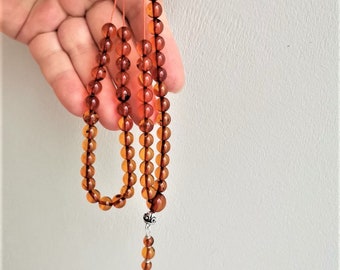 Amber worry beads, sterling silver and Baltic amber mala, dark ornage coloured amber beads, amber Greek worry beads