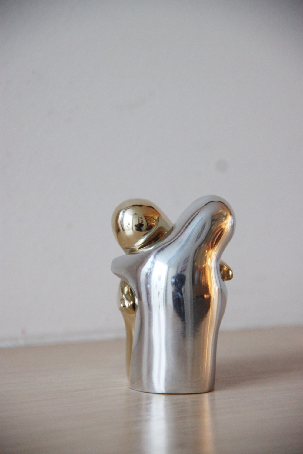 Embracing couple metal sculpture, abstract, minimalist sculpture of