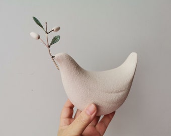 White dove sculpture, stoneware clay, unglazed dove figure with olive bough in beak, bird of peace gift
