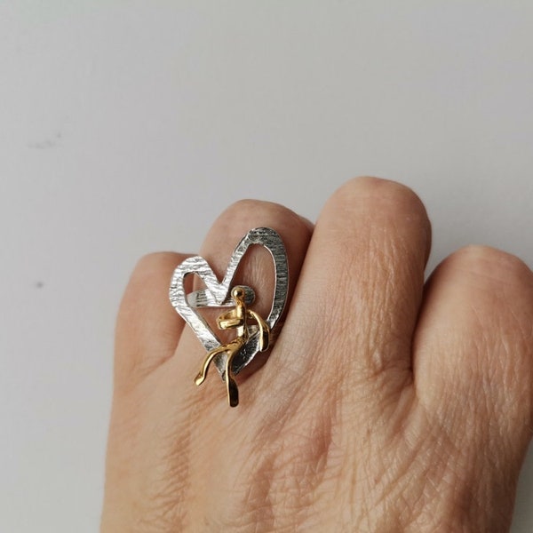 Heart silver ring, heart and figure gold - silver ring, silver heart outline with tiny, gold figurine, adjustable steling silver ring