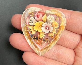 Vintage reverse carved heart shaped floral brooch in pastel shades