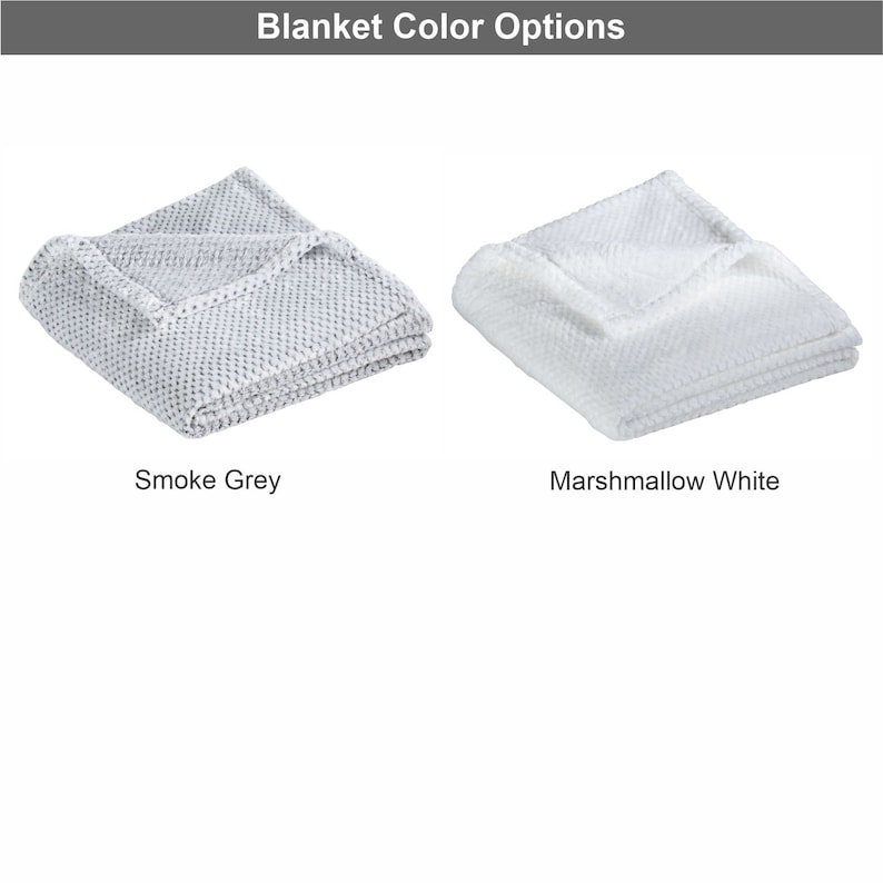 May include: Two folded blankets, one in smoke grey and one in marshmallow white.  Blanket Color Options.
