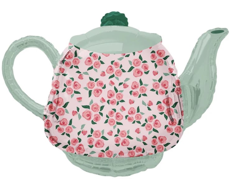 May include: A green and pink floral patterned teapot balloon. The balloon is shaped like a teapot with a handle and spout.