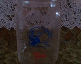 VTG tea jar with blue man fishing