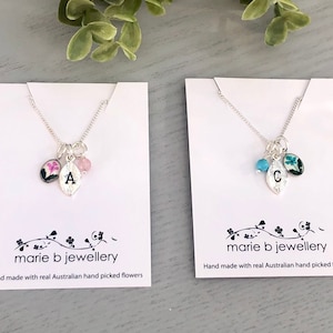 Monogram silver necklace with a real Australian flower charm